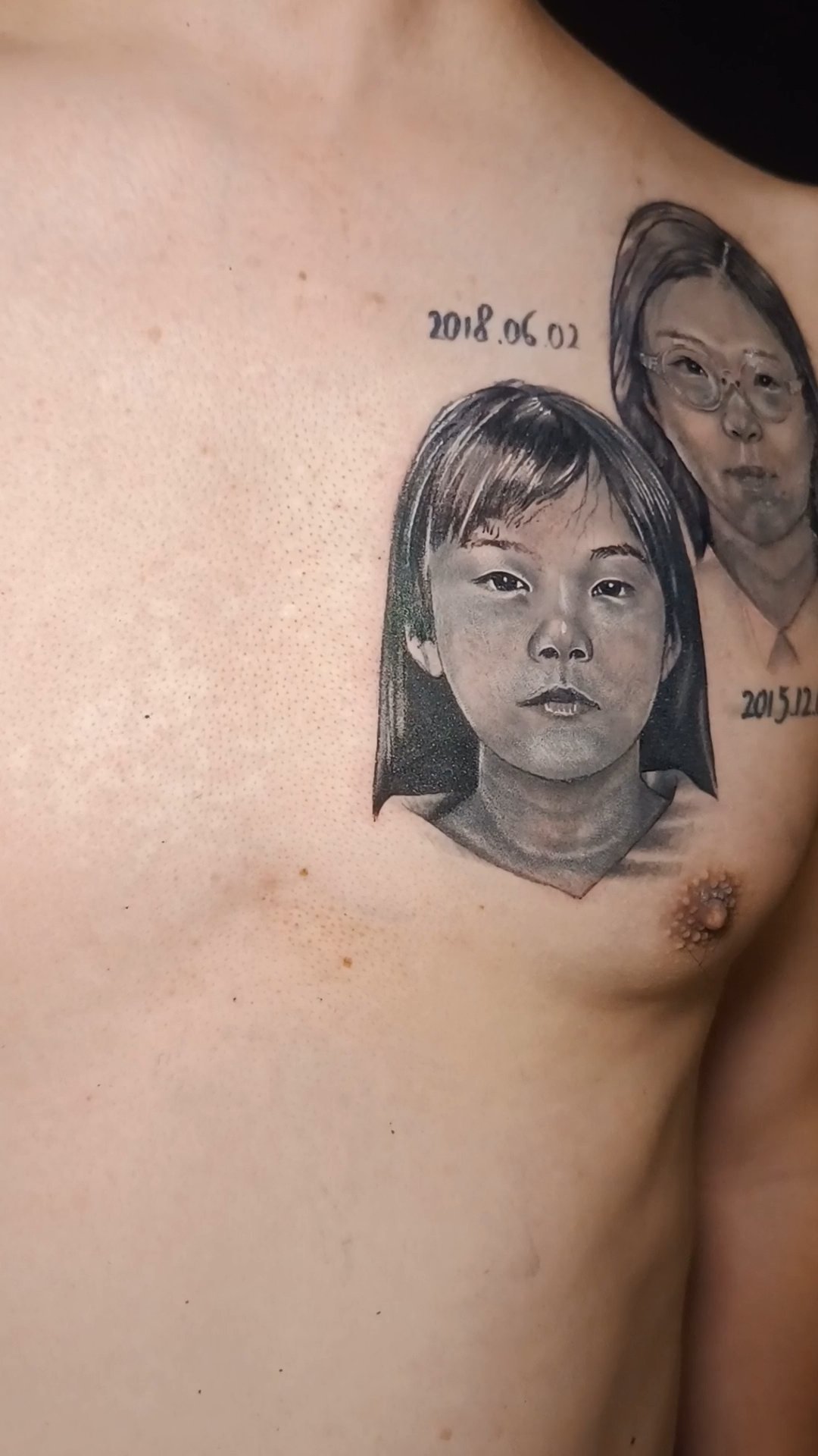 Realistic portrait tattoo cover-up on arm by Chetan Salhotra