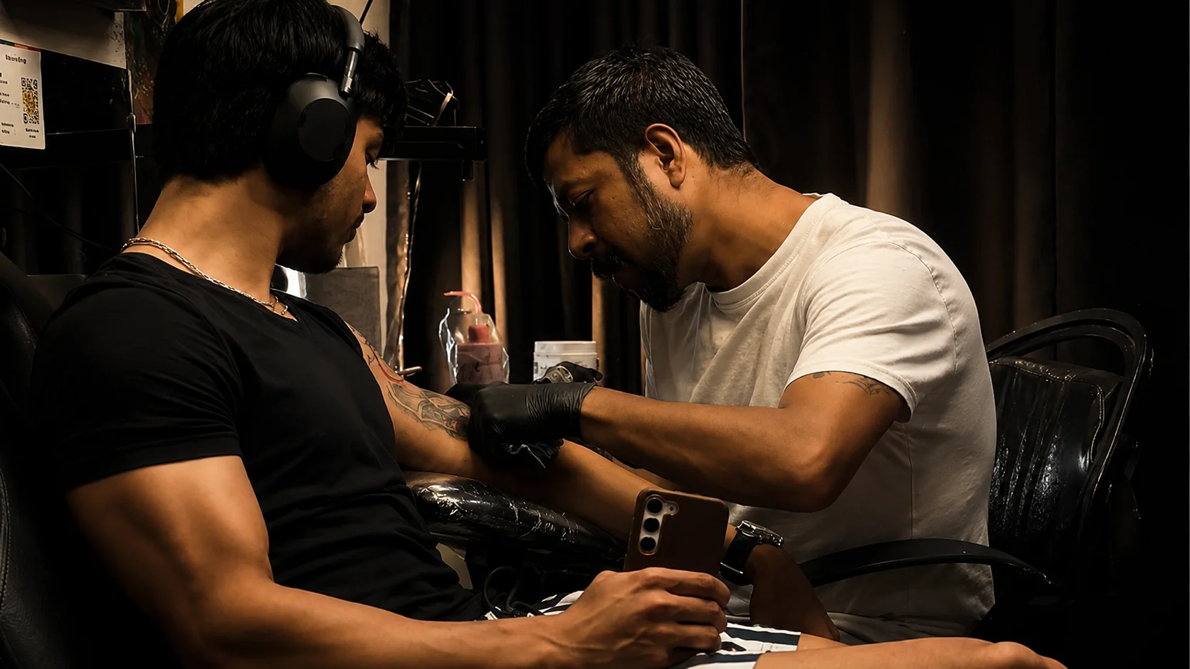 A tattoo session in progress at Inkspace Tattoo Studio, Hauz Khas