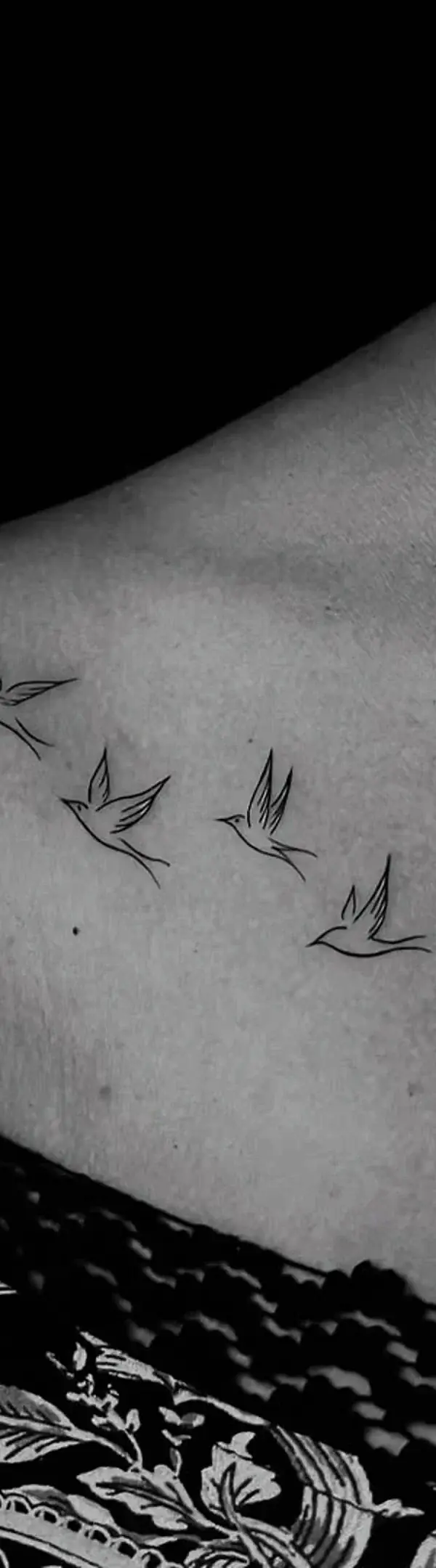 Fine line flying birds minimal outline tattoo on collarbone