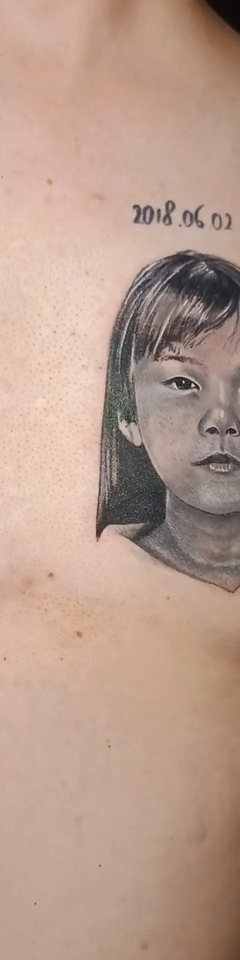 Realistic portrait tattoo cover-up on arm by Chetan Salhotra
