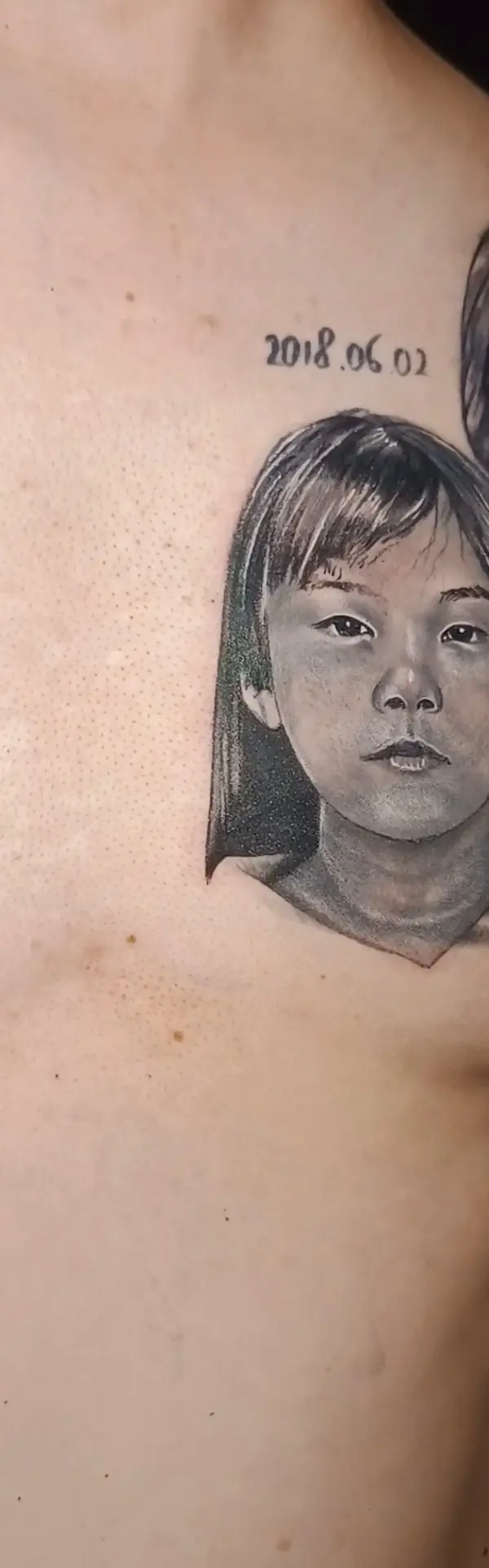 Realistic portrait tattoo cover-up on arm by Chetan Salhotra