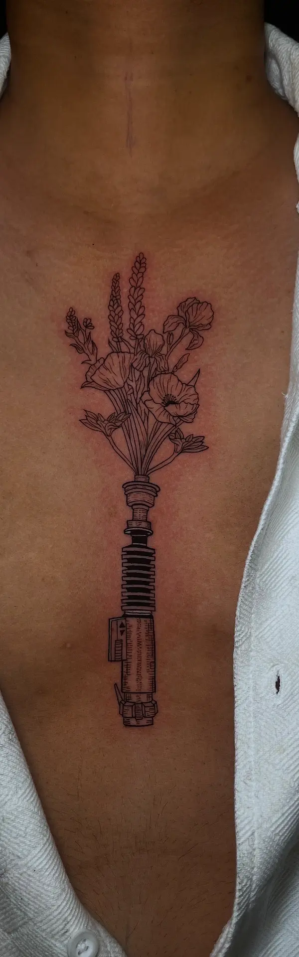 Fine line tattoo of Star Wars theme