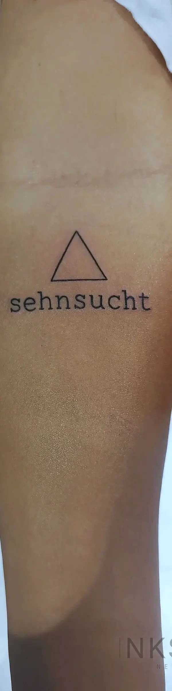 fine line tattoo depicting Sehnsucht by Chetan Salhotra