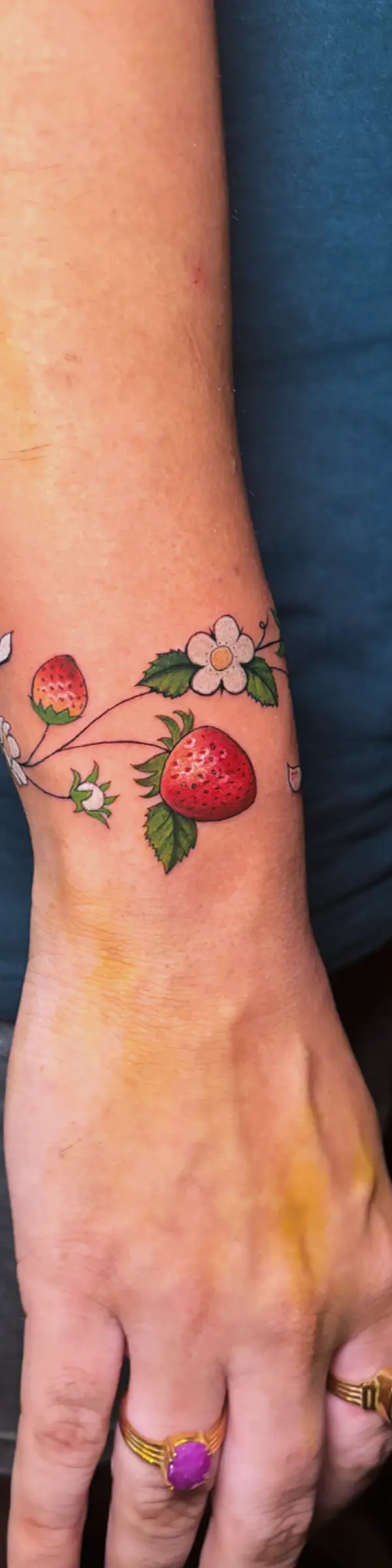 realism strawberry armband tattoo