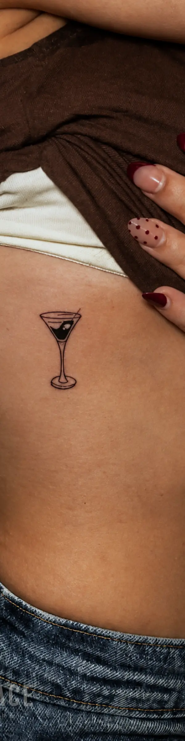 fine line martini glass tattoo design